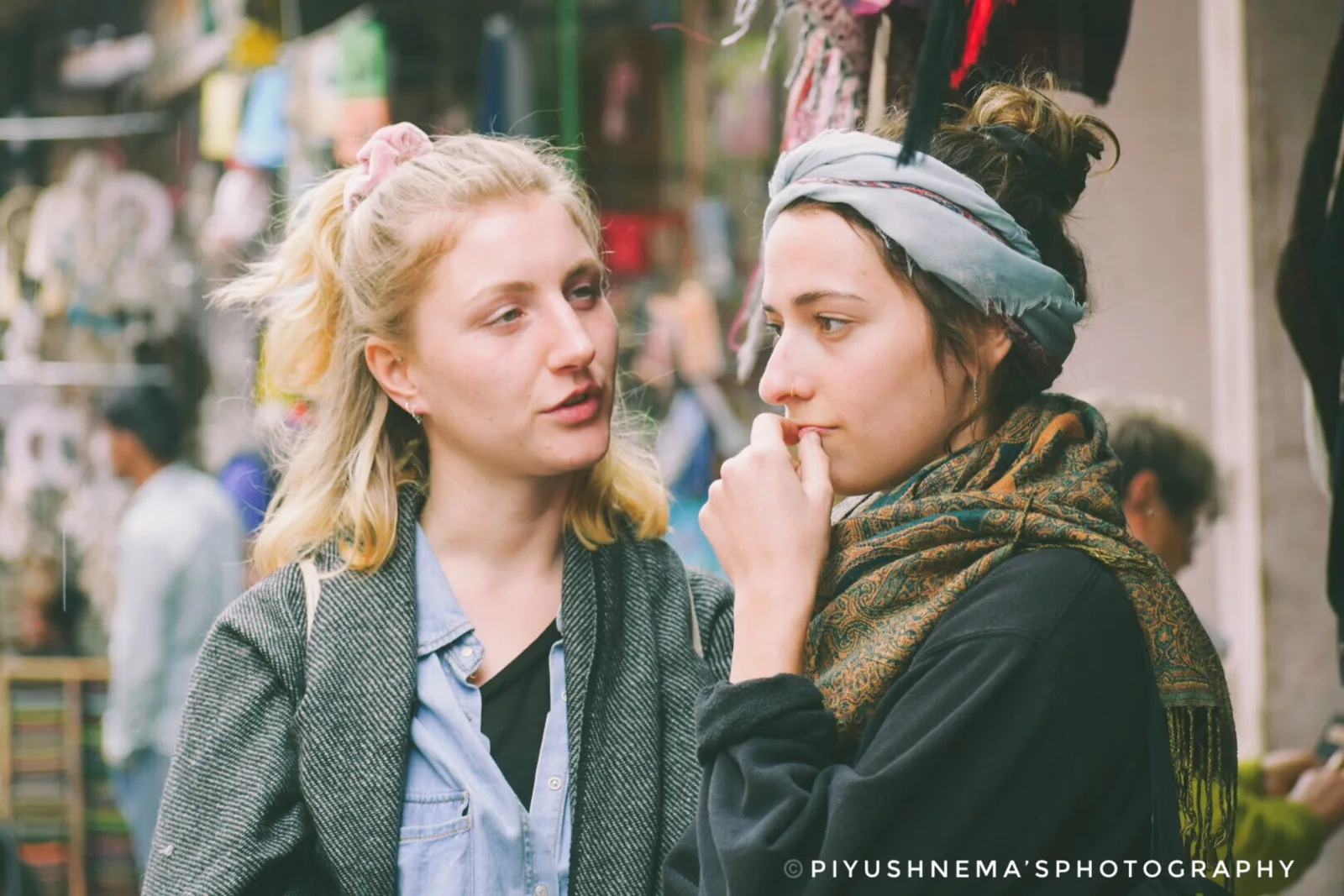 Travellers in the bazaar lanes — photography by Nemora